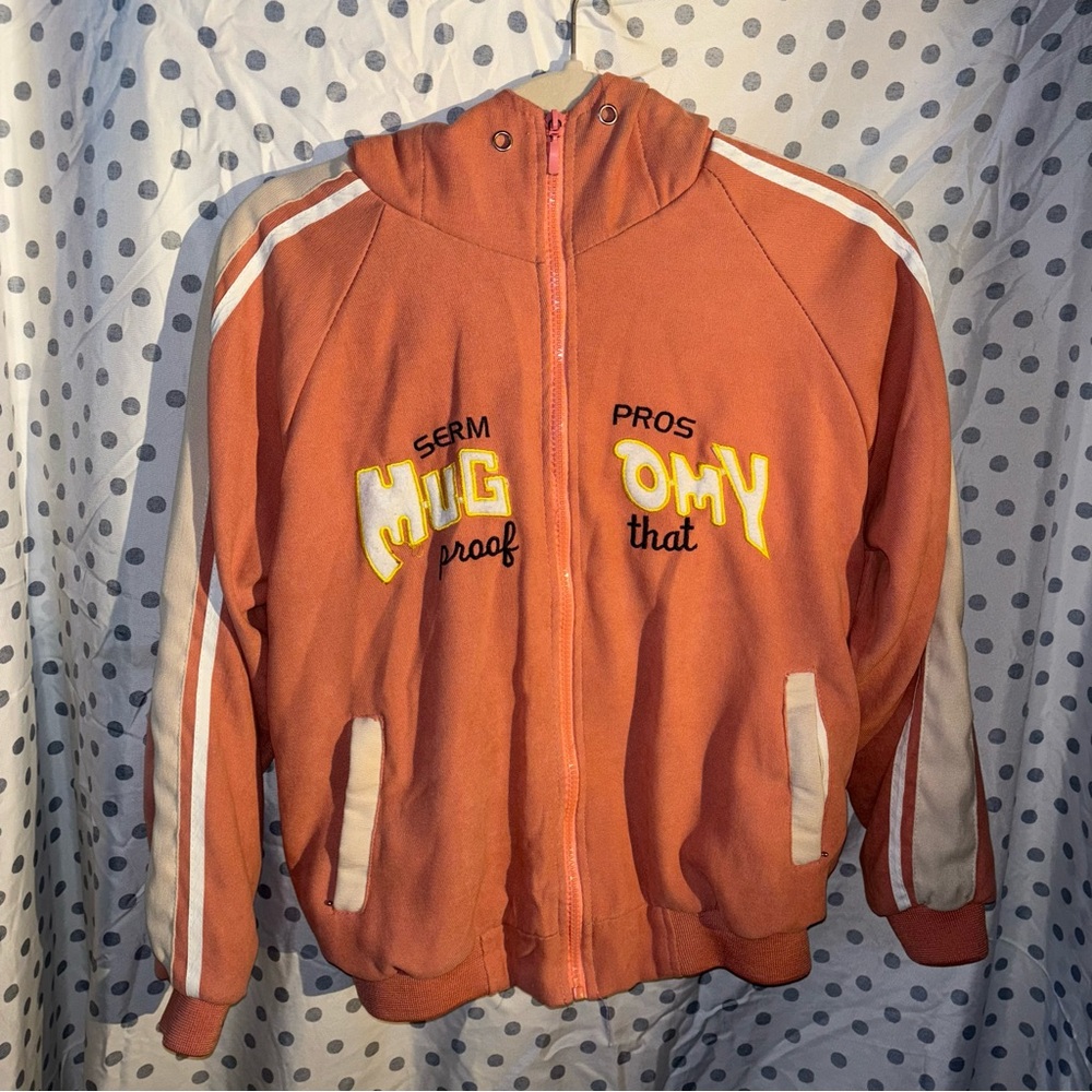 Mugomy peach and cream zip up jacket. No size
Possibly size S.